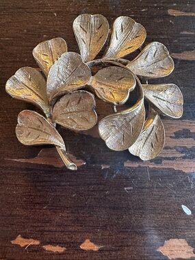 signed Francois Coro, gold tone 3D leafy front brooch